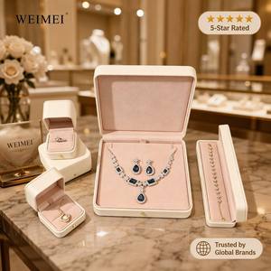 กล่องใส่เครื่องประดับแบบวงแหวน WEIMEI สั่งทำโลโก้ได้ ขายส่ง กล่องหนัง PU หรูหรา สีชมพู ด้านในเป็นสี่เหลี่ยมมุมโค้งมน - Product Image 1