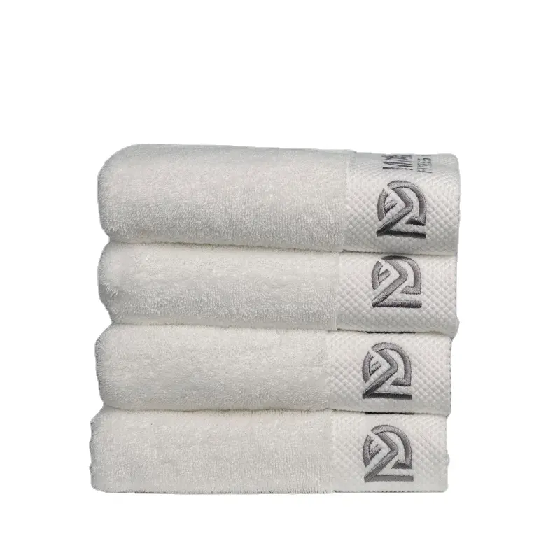 Venta al por mayor de lujo 100% algodón Toalla blanca de rizo personalizado logotipo bordado Toalla de cara de mano para el hotel