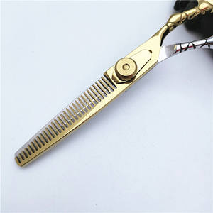 Tijeras de peluquería Inoue Huojian de 6.0 pulgadas, doradas, para entresacar, para diestros, de acero inoxidable DR56 - Product Image 3
