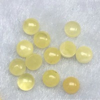 Vente en gros de cabochons d'ambre jaune en cire d'abeille naturelle pierres lisses à fond plat pour incrustation de bijoux lumière améliorée optique