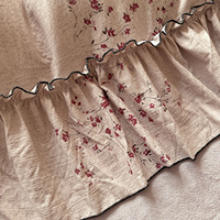 Ensemble de literie réversible 4 pièces avec housse de couette en velours laiteux style lin, imprimé fleurs de prunier, volants élégants