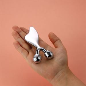 Masseur facial <span class=keywords><strong>Gua</strong></span> <span class=keywords><strong>Sha</strong></span> en alliage de zinc à double boule pour le lifting du visage en V, outil ergonomique pour raffermir les <span class=keywords><strong>yeux</strong></span> et les joues - Product Image 2