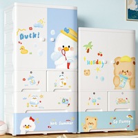 Armoire de rangement pour enfants en plastique avec dessins animés, roulettes, double porte, tiroirs et tringle de suspension
