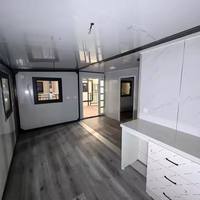 Maison préfabriquée en conteneur à deux étages, villa modulaire miniature à double niveau avec balcon, escalier, intérieur complet, cabane préfabriquée