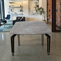 Usine chinoise vend des tables à manger réglables en verre trempé avec plateau en céramique et pieds en métal de luxe moderne personnalisés pour hôtel