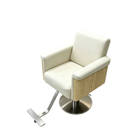 Nouvelle chaise de barbier ergonomique en cuir, style minimaliste, avec pompe hydraulique rotative et repose-pieds réglable