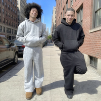 Ensemble survêtement homme en molleton de coton gris, coupe ample et oversize, double couche, avec pantalon évasé et sweat à capuche