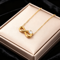 Ensemble Collier Symbole Infini Saint-Valentin et Bracelet Breloque Zirconium en Acier Inoxydable Doré Pendentif Bijoux de Mode Femme Cadeau