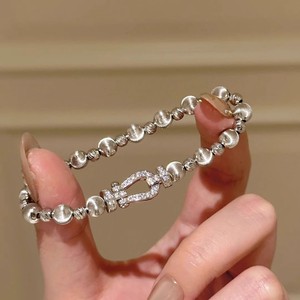 Bracciale Trendy con Fibbia a Ferro di Cavallo Effetto Occhio di Gatto Dorato, Bracciale Elastico Vintage di Alta Gamma per Feste - Product Image 2