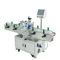 Machine d'étiquetage automatique pour bouteilles rondes, flacons, boîtes de conserve et pots, avec application d'étiquettes sur un ou deux côtés en plastique ou verre