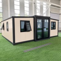 Maison préfabriquée modulaire extensible moderne à cadre noir, mini-maison de luxe, cabane de séjour en conteneur pour maison d'hôtes