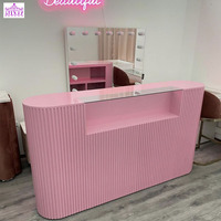 Meilleures ventes Bureau de réception rose adorable personnalisé Comptoir de salon de beauté Petite table de réception Bureau de réception circulaire pour salon de manucure