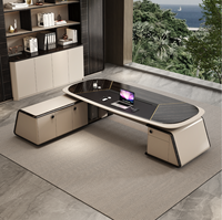 Bureau de direction ovale modulaire moderne personnalisé avec gestion intégrée des câbles, base à motif ondulé, éclairage LED et rangement