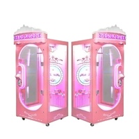 En gros Machine à griffes de poupées, Machine à griffes à couper les cordes, Machine de jeu à griffes pour la capture de jouets roses et de cadeaux