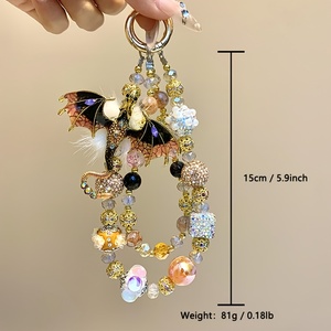 สายคล้องโทรศัพท์มือถือลายมังกรทองพรีเมียม ประดับขนนกสวยงาม ทำด้วยมือ พร้อมลูกปัด ตกแต่งกระเป๋า ใช้ได้กับโทรศัพท์ทุกรุ่น ของขวัญเครื่องประดับสำหรับเธอ - Product Image 2