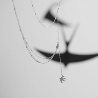 Collier Multicouche Tendance en Acier Inoxydable avec Pendentif Héron Volant pour Femme – Vente en Gros