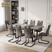 Chaise de restaurant rembourrée en gros, style ergonomique, dossier gris matelassé, ensemble de chaises cantilever ou décoration moderne pour salle à manger