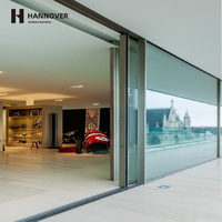 Système de porte coulissante en verre à double vitrage à grand panneau en aluminium moderne en fibre de verre pour maisons, hôtels et salons offrant une vue panoramique
