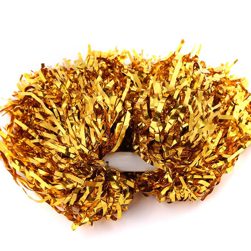 Filamento fino dorado con mango central.