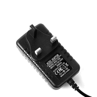 Adaptateur secteur 12V 2A avec prise UK, chargeur mural AC DC 24W CE FCC RoHS pour appareils électroniques, bandes lumineuses LED