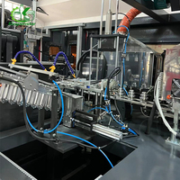 Machine de soufflage de bouteilles PET entièrement automatique à 4 cavités pour bouteilles en plastique de 1500 ml, 1000 ml, 500 ml, pour cola, eau, boissons gazeuses