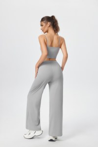 Set consisting of a sleeveless sports vest and loose-fitting, straight-leg <b>trousers</b> with an adjustable <b>drawstring</b>. - Product Image 4