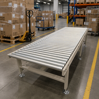 Système de convoyeur à rouleaux par gravité en acier au carbone robuste avec une vitesse de 20 m/min, garantie 1 an pour les fabricants de logistique d'entrepôt
