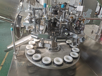 Machine automatique de remplissage et de scellage de tubes pour peintures, crèmes, dentifrices et onguents en aluminium