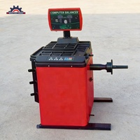 Machine d'équilibrage automatique des roues pour véhicules de grande taille avec affichage numérique vertical, support de pneu, 380V, 1200mm, 150kg