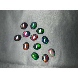 Ópalo Negro Etíope Natural, Cabujón Ovalado, Ópalo de Alta Calidad, Gema Suelta de 7*9 mm, 1.30 Quilates para Joyería - Product Image 1