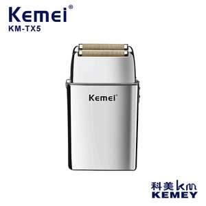 เครื่องโกนหนวดไฟฟ้า Kemei รุ่น KM-TX5 ใบมีดคู่ ตัวเครื่องโลหะ ชาร์จไฟได้ สำหรับผู้ชาย เครื่องเล็มหนวดเครา พร้อมสายชาร์จ USB สีเงิน - Product Image 4