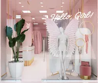 Présentoir de magasin de vêtements pour femmes de Style rose