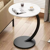 Mini table d'appoint ronde simple avec quelques coins pour les petites tables de café de salon et d'appartement à manger à la maison