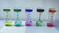 Nouveau liquide mouvement minuterie jouets sensoriels sablier liquide goutte à goutte minuterie jouets promotionnels calmer bouteille pour les enfants