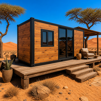 Maison conteneur moderne extensible à double aile de 10 pieds, préfabriquée et modulaire, pour bureau de jardin et vie en plein air