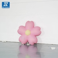 Grande fleur gonflable rose pour la décoration publicitaire de scène de centre commercial et de fête