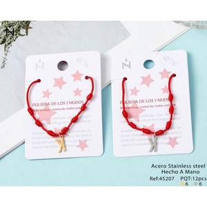 Bracelet à sept nœuds en fil rouge avec breloque lettre K en acier inoxydable, fait main, bijou de protection unisexe, cadeau - Product Image 1