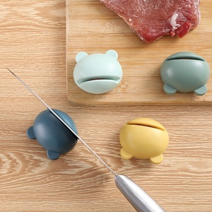 Aiguiseur de couteaux en forme de dessin animé. Un outil créatif et miraculeux pour la cuisine, une pierre à aiguiser à usage domestique. - Product Image 1