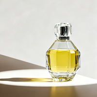 Nouveau flacon de parfum en verre de 100 ml ressemblant à une grenade avec pulvérisateur à pompe, design sérigraphié, emballé dans un carton, couleur personnalisée