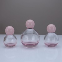 Flacons de parfum sphériques en verre rose de luxe 30ml 50ml 100ml avec atomiseur à bouchon boule et pulvérisateur à sertir pour parfum et huiles essentielles