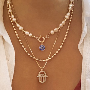 Collar de cadena de eslabones de <span class=keywords><strong>perlas</strong></span> doradas con colgante de aleación de imitación de <span class=keywords><strong>ojos</strong></span>, elegante y de nicho, para mujer, estilo vintage, para la clavícula. - Product Image 5
