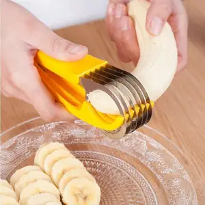 Penjualan terlaris alat piring buah sayuran pengiris pisang kecil sosis Ham timun potong kreatif pemotong Melon