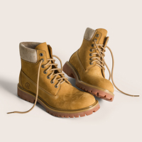 Chaussures de randonnée d'extérieur classiques jaunes à semelle épaisse en cuir pleine fleur, montantes mi-mollet, vintage, unisexe, personnalisées, pour l'hiver, vente en gros