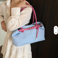 Sac à bandoulière en jean grande capacité pour femme, nouvelle collection 2025, tendance, avec fermeture éclair contrastante sous le bras et deux bretelles