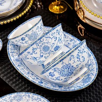 Ensemble de bols et d'assiettes en céramique de luxe de Jingdezhen, nouveau motif végétal chinois, émail bleu et blanc, passe au micro-ondes, cadeaux pour les mariages et les célébrations