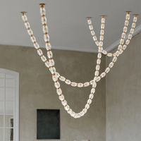 Lustre en verre de style collier de luxe, lampe sur mesure pour plafond haut, luminaire suspendu pour hall de villa