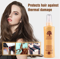 Spray coiffant sans rinçage à l'huile d'argan bio Arganmidas avec protection thermique et texture pour cheveux bouclés