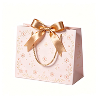 Sacs cadeaux classiques minimalistes avec nœud et ruban estampé or, emballage pour cadeaux d'entreprise avec corde