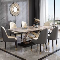 Ensemble table à manger extensible en métal de luxe léger de style italien moderne minimaliste à usage domestique appartements d'hôtel nouveau rectangulaire