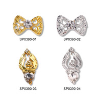 En gros YUCAGCI Breloques pour ongles en alliage 3D Nœud Papillon Ange Or Argent Strass Rétro Creux Accessoires de Nail Art Chine
